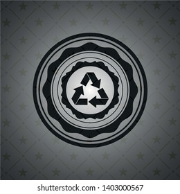recycle icon inside dark emblem