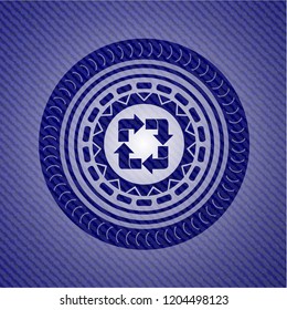 recycle icon inside denim background