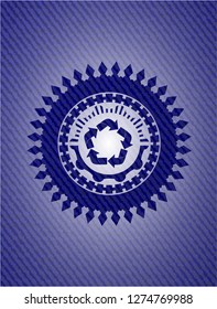 recycle icon inside denim background