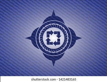 recycle icon inside denim background