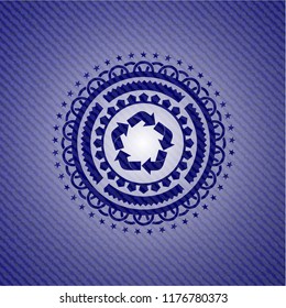 recycle icon inside emblem with denim texture