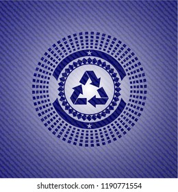 recycle icon inside emblem with jean background