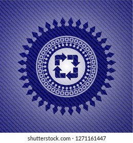 recycle icon inside emblem with jean background