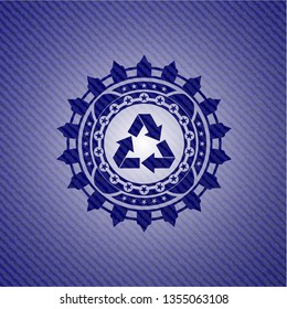 recycle icon inside emblem with jean texture