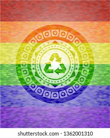 recycle icon inside emblem on mosaic background with the colors of the LGBT flag