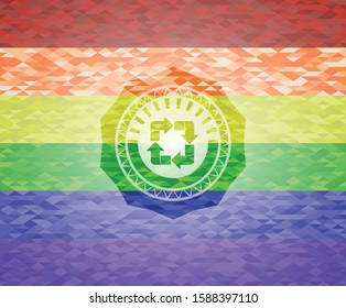 recycle icon inside emblem on mosaic background with the colors of the LGBT flag