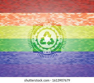 recycle icon inside emblem on mosaic background with the colors of the LGBT flag