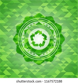 recycle icon inside green mosaic emblem