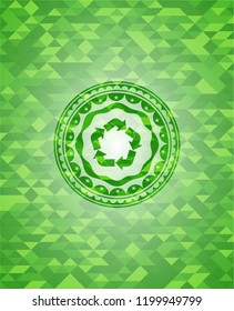 recycle icon inside green mosaic emblem