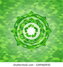 recycle icon inside green mosaic emblem