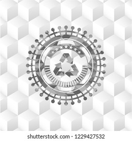 recycle icon inside grey badge with geometric cube white background