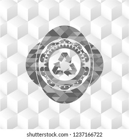 recycle icon inside grey badge with geometric cube white background