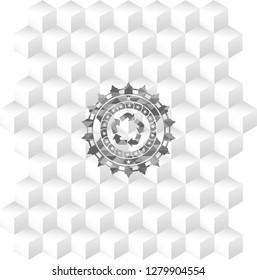 recycle icon inside grey badge with geometric cube white background