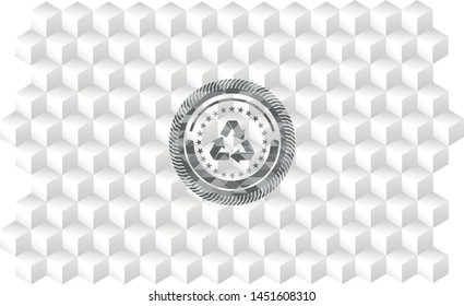 recycle icon inside grey badge with geometric cube white background