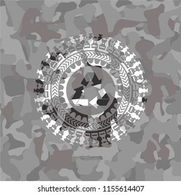 recycle icon inside grey camo emblem