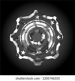 recycle icon inside grey camo texture