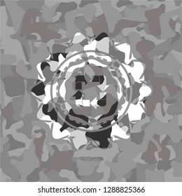 recycle icon inside grey camo emblem