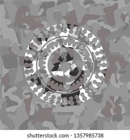 recycle icon inside grey camo emblem