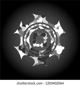 recycle icon inside grey camouflage emblem