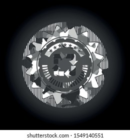 recycle icon inside grey camouflaged emblem
