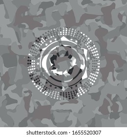 recycle icon inside grey camouflaged emblem