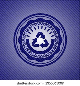 recycle icon inside jean or denim emblem or badge background