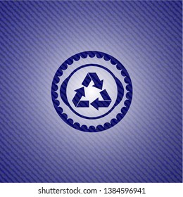 recycle icon inside jean or denim emblem or badge background