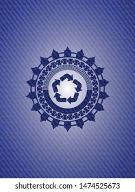 recycle icon inside jean or denim emblem or badge background