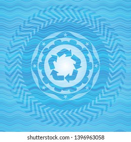 recycle icon inside light blue water wave emblem.