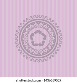 recycle icon inside pink emblem