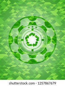 recycle icon inside realistic green mosaic emblem