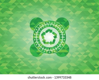recycle icon inside realistic green mosaic emblem