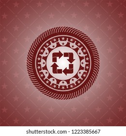 recycle icon inside realistic red emblem