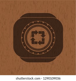 recycle icon inside realistic wood emblem