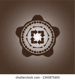 recycle icon inside realistic wood emblem