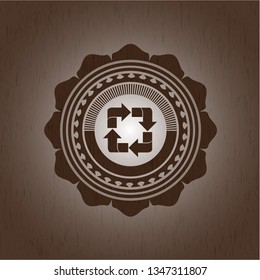 recycle icon inside realistic wooden emblem
