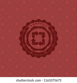 recycle icon inside red emblem