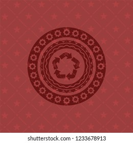 recycle icon inside red emblem