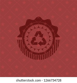 recycle icon inside red emblem