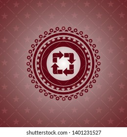 recycle icon inside red emblem