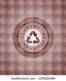 recycle icon inside red seamless geometric badge.