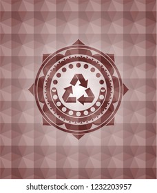 recycle icon inside red seamless emblem with geometric pattern.