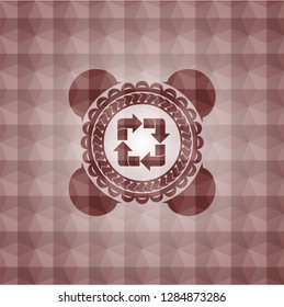recycle icon inside red seamless emblem with geometric pattern background.