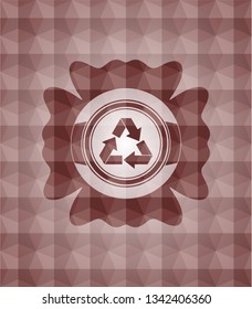 recycle icon inside red seamless emblem with geometric pattern background.