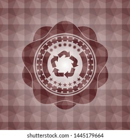 recycle icon inside red seamless emblem with geometric background.