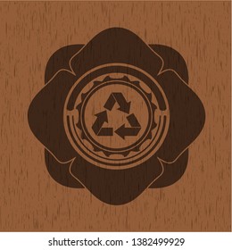 recycle icon inside retro style wood emblem
