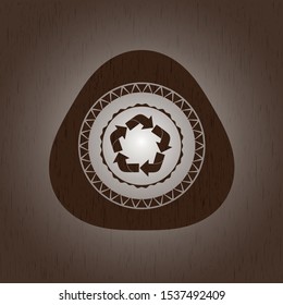 recycle icon inside retro style wood emblem