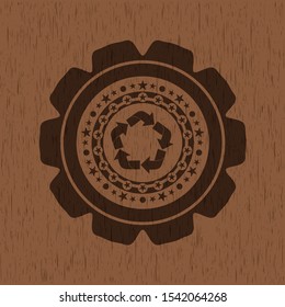 recycle icon inside retro style wood emblem