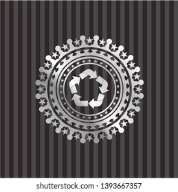 recycle icon inside silver badge or emblem