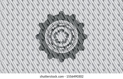 recycle icon inside silver color emblem or badge. Scales pattern. Vector Illustration. Detailed.